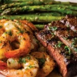 garlic butter ribeye steak and shrimp 2026 04 03 214843 1024x574 1