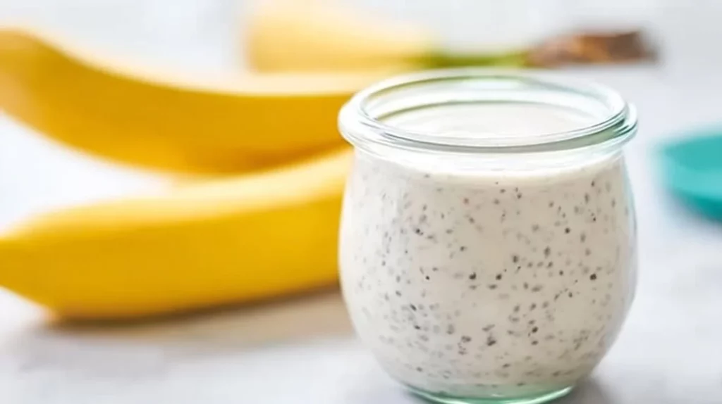 Delicious banana chia pudding topped with fresh bananas and chia seeds