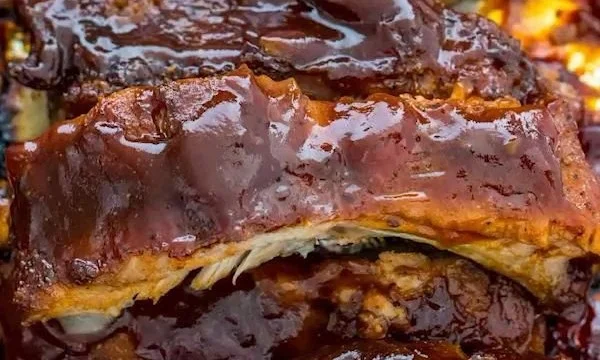Oven barbecue ribs seasoned with a homemade rub, ready to serve.
