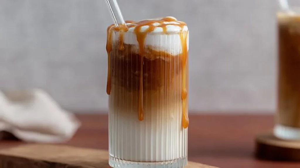 Salted Caramel Cold Brew topped with creamy froth and caramel drizzle