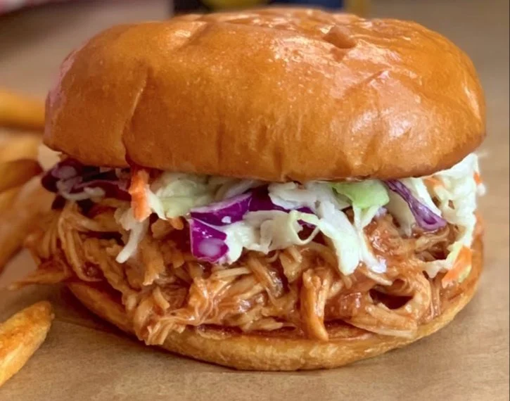 Delicious BBQ chicken sandwiches made in a crockpot for easy meal preparation